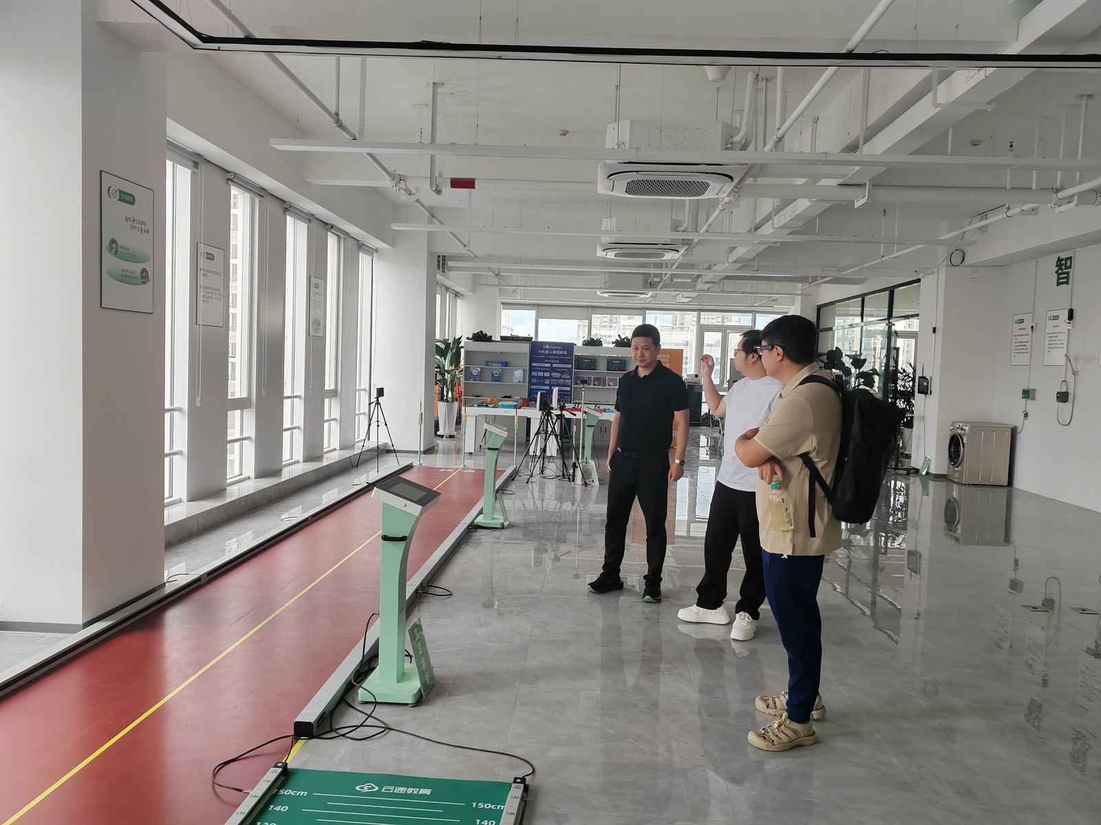 Visitors on a walkthrough of a company facility.